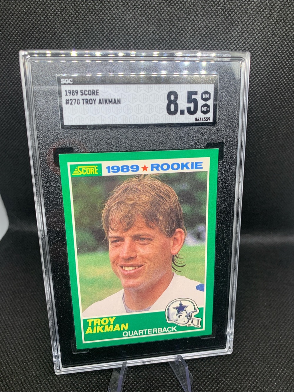 1989 Topps Troy Aikman Rookie Card Graded Near Mint-Mint In Plastic Sleeve Nice!